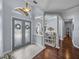 Elegant foyer with a high ceiling, decorative columns, and a view into the dining area at 800 Osprey Landing Dr, Lakeland, FL 33813