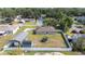 An aerial view of the fenced backyard, shed, and RV awning at 818 Fairlane Dr, Lakeland, FL 33809