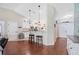 Bright, open layout connecting the living room, kitchen, and foyer for easy entertaining at 818 Fairlane Dr, Lakeland, FL 33809