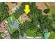 Expansive property featuring lush greenery, neighboring homes, and possible pool area at 909 Lake Deeson Pt, Lakeland, FL 33805