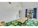 Bright playroom featuring a learning center and a green leaf rug at 3822 Charter Rd, Lakeland, FL 33810
