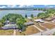 Waterfront neighborhood with houses, lake access, and mature trees at 118 Lake Sears Dr, Winter Haven, FL 33880