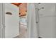 Full bathroom with walk-in shower, wood paneled ceiling, and tile flooring at 118 Lake Sears Dr, Winter Haven, FL 33880