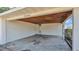 Covered parking area with wood ceiling at 118 Lake Sears Dr, Winter Haven, FL 33880