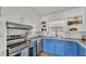 Well-lit kitchen featuring subway tile backsplash and stainless steel appliances at 118 Lake Sears Dr, Winter Haven, FL 33880