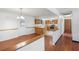Inviting dining room with hardwood floors and easy access to the well-equipped kitchen at 120 Bolender Rd, Auburndale, FL 33823