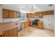 Well-appointed kitchen features ample counter space, stainless steel appliances, and abundant cabinetry at 120 Bolender Rd, Auburndale, FL 33823