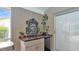 Outdoor Bar with mini fridge and decorative accent pieces at 146 Woodside Dr, Lakeland, FL 33813