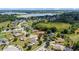 Beautiful home near a lake, set in a tranquil neighborhood with lush greenery and a serene atmosphere at 1519 Blue Sky Blvd, Haines City, FL 33844