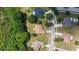 A prime aerial shot shows the home's location on a quiet, tree-lined street at 1519 Blue Sky Blvd, Haines City, FL 33844