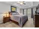 Comfortable bedroom with large window and plush carpeting at 1519 Blue Sky Blvd, Haines City, FL 33844