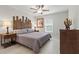Comfortable bedroom with a modern lamps and decor at 1519 Blue Sky Blvd, Haines City, FL 33844