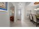 Bright entryway with an open view to the dining room and living room at 1519 Blue Sky Blvd, Haines City, FL 33844