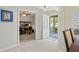 Bright entryway with an open view to the office space and dining room at 1519 Blue Sky Blvd, Haines City, FL 33844
