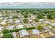 Aerial view of a well-maintained mobile home community with lush green trees at 1565 Heather Hill Dr, Lakeland, FL 33810