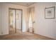 Bedroom with carpet flooring, mirrored closet, and natural light from a window at 1565 Heather Hill Dr, Lakeland, FL 33810