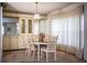 Well-lit dining area with matching table, chairs, and built-in cabinetry at 1565 Heather Hill Dr, Lakeland, FL 33810