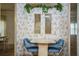 A dining area with table and chairs has decorative plant at 1565 Heather Hill Dr, Lakeland, FL 33810