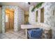 Eat-in kitchen with table and chairs has decorative plant at 1565 Heather Hill Dr, Lakeland, FL 33810