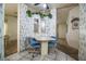 Eat-in kitchen with table and chairs has decorative plant at 1565 Heather Hill Dr, Lakeland, FL 33810