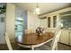 Traditional dining room featuring a wood table, chairs and built in cabinetry, ideal for Gathering meals at 1565 Heather Hill Dr, Lakeland, FL 33810