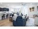 Open concept living space featuring modern décor and an integrated kitchen with island seating at 1806 Teleford Rd, St Cloud, FL 34771