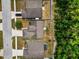 Aerial view of the backyards of several homes in a quiet neighborhood at 1825 Wallace Manor Ln, Winter Haven, FL 33880