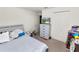 Bedroom with a queen sized bed, dresser and double closet at 1825 Wallace Manor Ln, Winter Haven, FL 33880