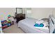Bedroom with a queen sized bed, and dresser at 1825 Wallace Manor Ln, Winter Haven, FL 33880