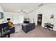 Comfortable living room with a vaulted ceiling, natural lighting, and easy access to other rooms at 1825 Wallace Manor Ln, Winter Haven, FL 33880