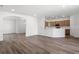 Bright living room featuring neutral walls, wood-look flooring and modern recessed lighting at 2033 Summerlake Dr, Auburndale, FL 33823