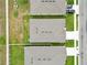 Aerial view of rooftops in a neighborhood highlighting the layout of homes at 2039 Rosewood Cir, Lakeland, FL 33810