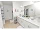 Bright bathroom featuring double sinks, vanity space, and modern fixtures at 2039 Rosewood Cir, Lakeland, FL 33810