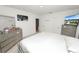 Bright bedroom with silver furniture set, carpet flooring, and clean decor at 2039 Rosewood Cir, Lakeland, FL 33810