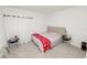 Simple bedroom with neutral tones, soft lighting, and minimalist decor at 2039 Rosewood Cir, Lakeland, FL 33810