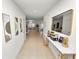 Inviting hallway leading to the living and dining areas with modern decor at 2039 Rosewood Cir, Lakeland, FL 33810