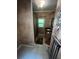 Small, earth-toned bathroom with a shower and tub, window, vanity, and decorative accents at 236 E Seminole Ave, Lake Wales, FL 33853