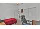 Bedroom featuring a closet, desk space, and comfortable bed, designed for rest and productivity at 242 Kings Pond Sw Ave, Winter Haven, FL 33880