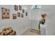 Inviting foyer with tile flooring, decorative wall hangings, and a charming welcome mat at 242 Kings Pond Sw Ave, Winter Haven, FL 33880