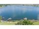 Expansive lake view featuring boat docks in this aerial photograph at 254 Lake Tennessee Dr, Auburndale, FL 33823