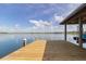 Picturesque boathouse on a private dock, offering stunning views of the tranquil lake at 254 Lake Tennessee Dr, Auburndale, FL 33823