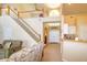 This spacious foyer features a staircase, high ceilings, and double door entry at 254 Lake Tennessee Dr, Auburndale, FL 33823