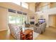 This spacious living room boasts a cozy fireplace, sliders, and access to an outdoor patio at 254 Lake Tennessee Dr, Auburndale, FL 33823