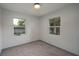 A view of a bedroom that has two windows at 315 Eastway Dr, Lakeland, FL 33803