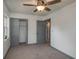 Bedroom featuring carpet, closet with doors and painted trim at 315 Eastway Dr, Lakeland, FL 33803