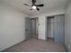 Comfortable bedroom with a ceiling fan, closet and neutral finishes at 315 Eastway Dr, Lakeland, FL 33803