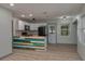 Updated kitchen with a colorful island, sleek appliances, and modern finishes at 315 Eastway Dr, Lakeland, FL 33803
