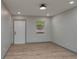 Bright living room with wood-look floors, fresh paint, and natural light at 315 Eastway Dr, Lakeland, FL 33803