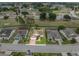 A beautiful neighborhood with lush landscaping and a perfectly manicured lawns from an aerial perspective at 3341 Highland Fairways Blvd, Lakeland, FL 33810