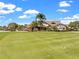 A meticulously maintained golf course surrounds the community's charming, Tudor-style clubhouse at 3341 Highland Fairways Blvd, Lakeland, FL 33810
